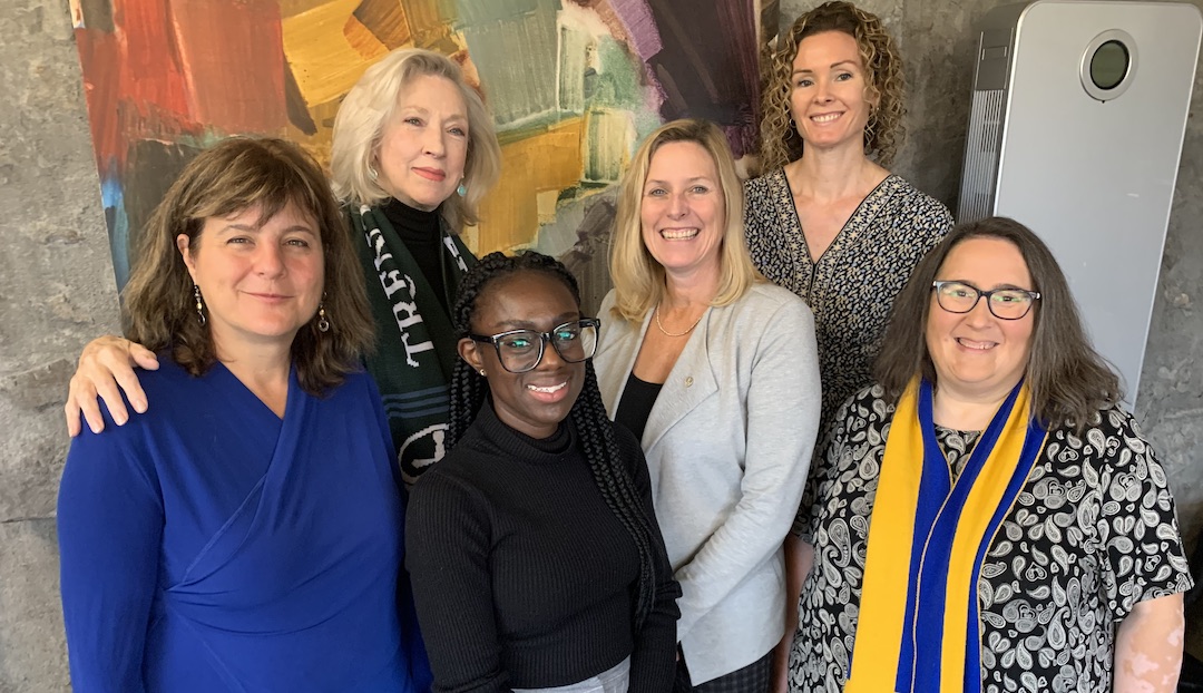 Trent Alumna Elizabeth Wills-Edwards with other Trent University members