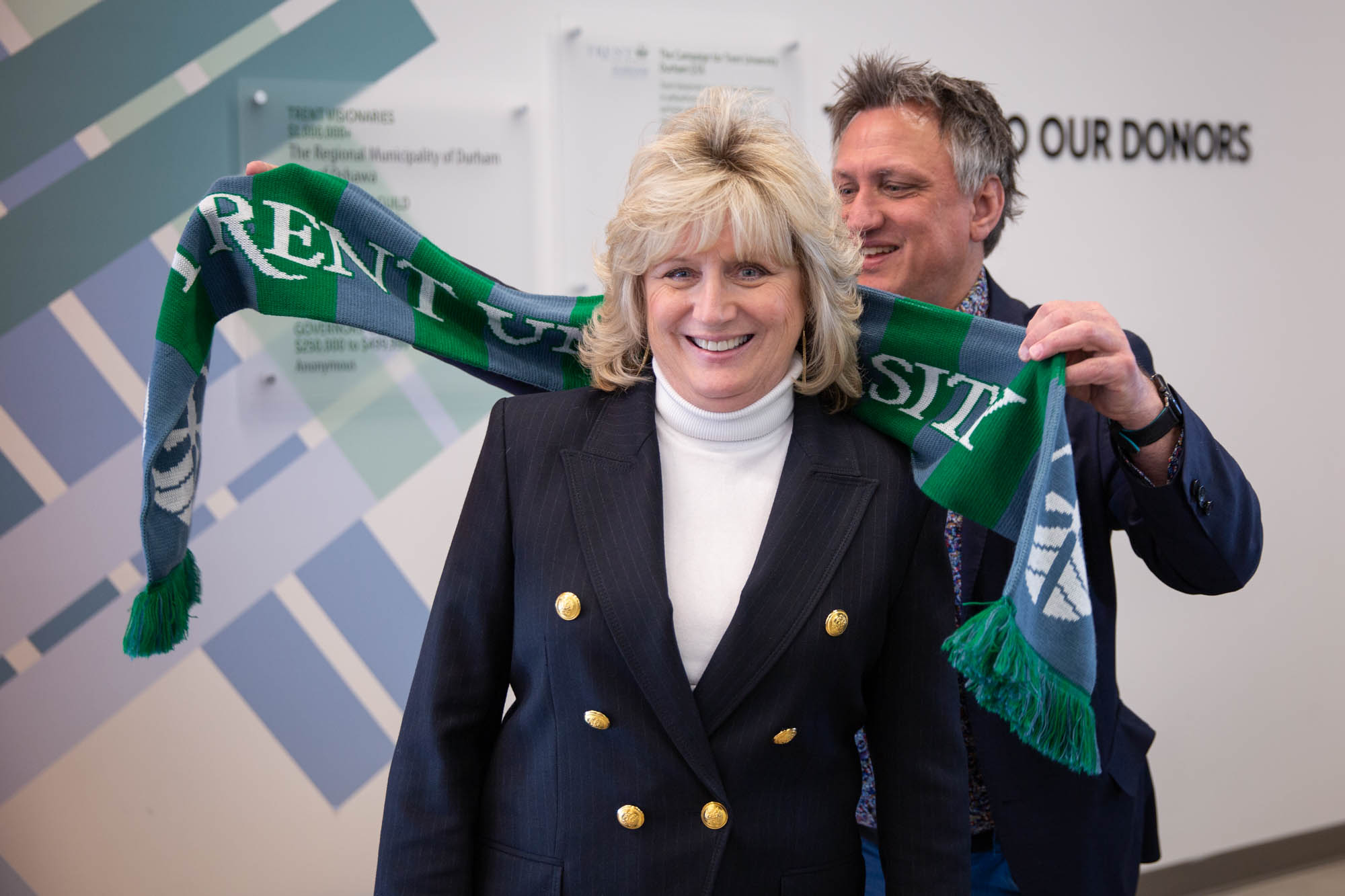 Scarf being placed upon woman