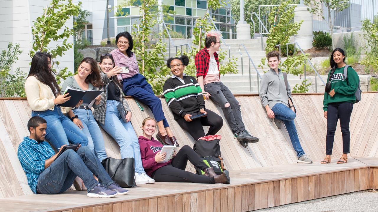 Trent students enjoy the new outdoor seating area named in recognition of the support from Doug & Mary Kirk 