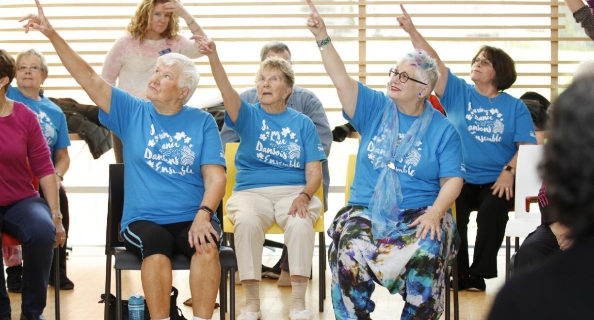 Elder people pointing upon the sky